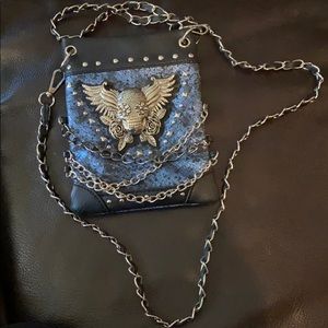 Brand new crossbody bag. Metal detail.